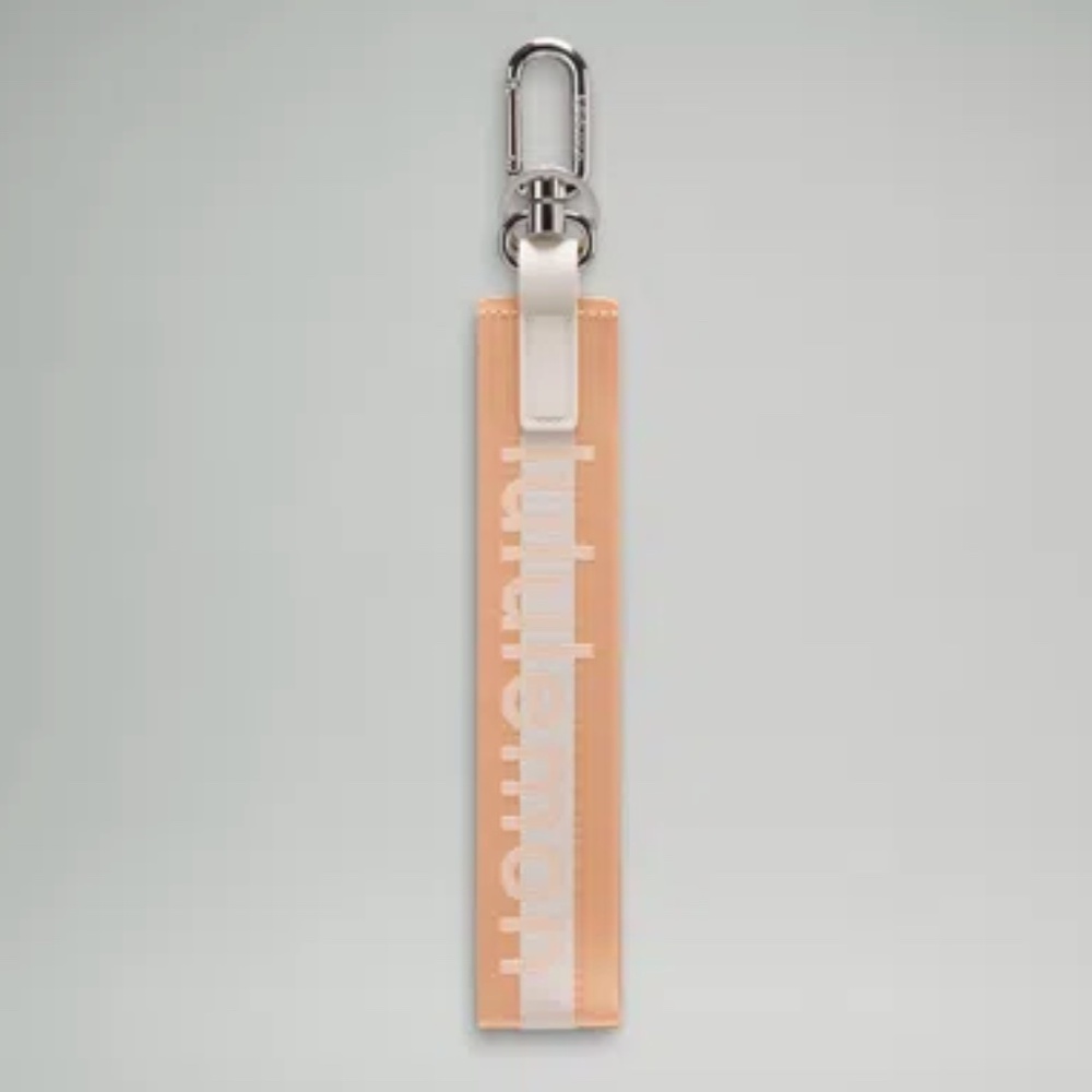 Lululemon - Never Lost Keychain *Wordmark - Peach Bellini - NWoT